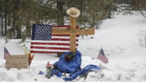 A memorial for Robert “LaVoy” Finicum is seen where he was shot and killed by law enforcement on a highway north of Burns, Oregon January 30, 2016. Four armed anti-government protesters held their ground at the remote Malheur National Wildlife Refuge in Oregon on Saturday, two days after the FBI released a video of the fatal shooting of one of the group's spokesmen during a traffic stop. REUTERS/Jim Urquhart